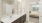 a bathroom with sinks and a mirror